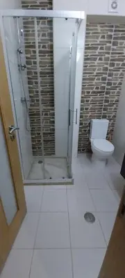 a bathroom with a shower and a toilet at Ca’ Tina in Santa Maria