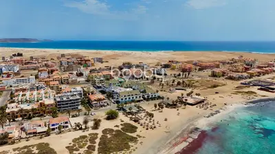 an aerial view of a resort on the beach at Leme Bedje Three bedroom - By Bobbywashere in Santa Maria