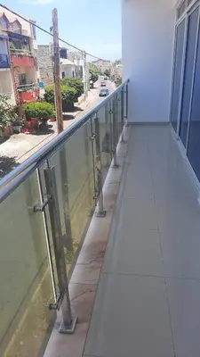 a balcony of a building with a view of a street at My Flat 2 in Praia