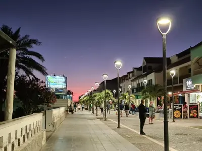 a street with many street lights on a sidewalk at Plaza Top floor apartment in Santa Maria