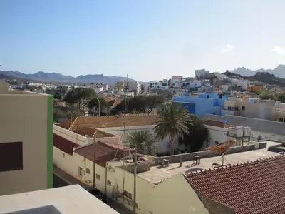 a view of a city with buildings and palm trees at Studio Maya Mindelo in Mindelo