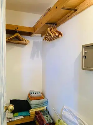 a room with a bunch of towels on a wall at Holiday Properties Casa Laranja in Santa Maria