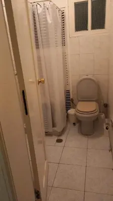 a bathroom with a toilet and a shower at Recanto da Montanha in Rui Vaz