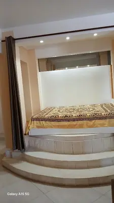a bed in a room with a window at Beach Villa am Praia de Chaves, Boa Vista, Cabo Verde in Boa Ventura
