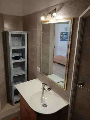 a bathroom with a sink and a mirror at Beach Villa am Praia de Chaves, Boa Vista, Cabo Verde in Boa Ventura