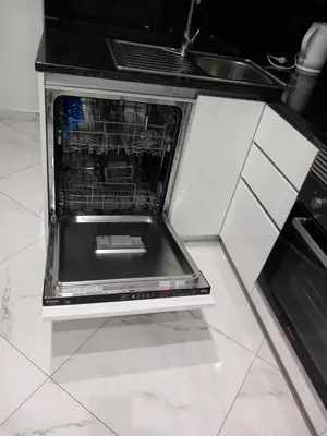 an oven with its door open in a kitchen at Edifício 2PALMA in Praia