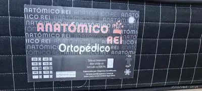 a sign on the side of a wall with a bunch of numbers at Óscar in Mindelo