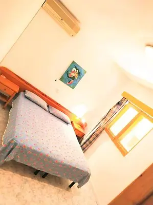 an overhead view of a bed in a room at Feeling Cabo Verde in Beirona