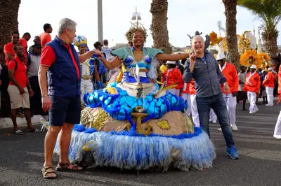 a woman in a float in a parade at Casa Comba in Mindelo