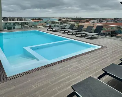 a large swimming pool on top of a building at SMR AP08 in Santa Maria