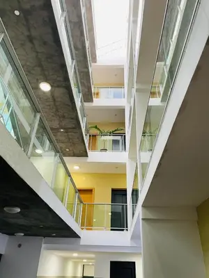 a staircase in a building with glass ceilings at SMR AP08 in Santa Maria