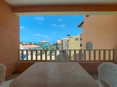 a view of a balcony with a table and chairs at Sal service coquero in Santa Maria