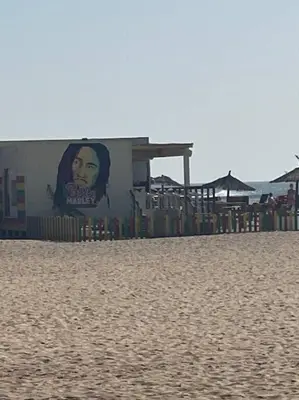 a building with a painting on the side of it at NEW Luxury Condo - In the heart of Santa Maria in Santa Maria