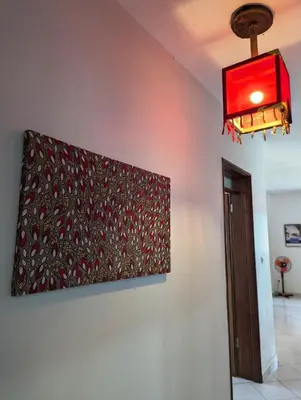 a painting hanging on a wall in a room at Apartment Funana Tarrafal in Tarrafal