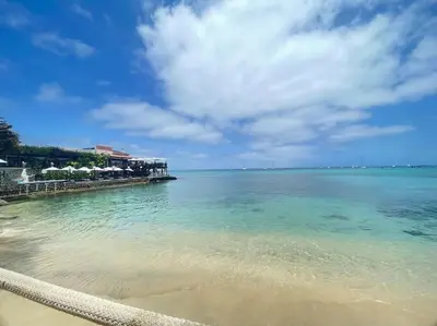 a view of the ocean with a beach and buildings at Salty Apartments in Santa Maria