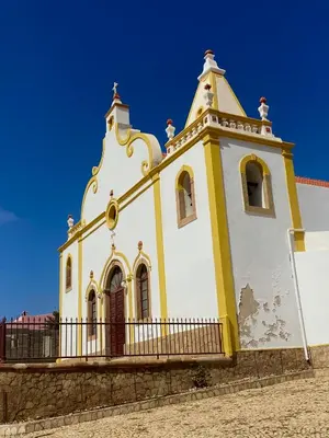 a church with a yellow and white building at Estudio para dos personas-Stella Maris Villa FREE PICK UP in Calheta Do Maio