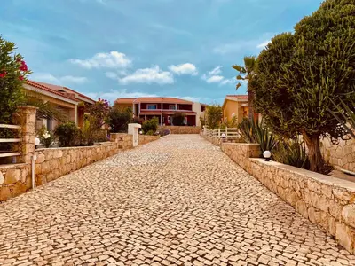 a cobblestone street in front of a house at Estudio para dos personas-Stella Maris Villa FREE PICK UP in Calheta Do Maio