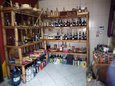 a room filled with lots of bottles of alcohol at SANDRO Paul Residenciel in Paul