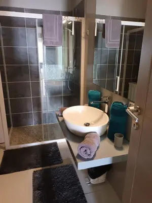 a bathroom with a sink and a shower at Ocean Dream BeachHouse Boa Vista in Sal Rei
