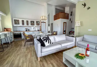 a living room with a couch and a table at Un hogar lejos de tu hogar in Sal Rei