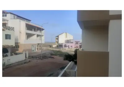 a view of a city from a balcony of a building at Tommy's Apartment in Santa Maria