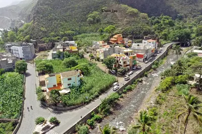 an aerial view of a city with a mountain at Alfa-apartamento in Pombas
