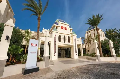 a building with a rcu sign in front of it at Hotel Riu Karamboa - Adults Only - All Inclusive in Rabil