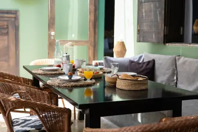 a black table with food on it in a living room at Casa Archipel - Lagedos in Ribeira Fria