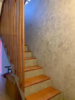a stairway with wooden steps in a house at Kasa Wahnon in Pombas