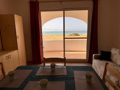 a living room with a view of the ocean at Nautilus Cabral Sea view, free Wi-Fi in Sal Rei
