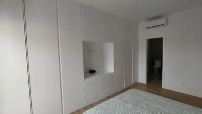 a white room with white walls and a white cabinet at Sunset in Mindelo