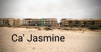 a beach with the words c jasmine written in the sand at Turtle Apart in Sal Rei