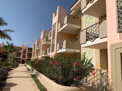 a walkway in front of a building at Tropical Pool View - By Bobbywashere in Santa Maria