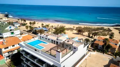 an aerial view of a hotel and the beach at Apartamento Praia Santa Maria in Santa Maria