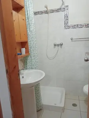 a bathroom with a sink and a shower at Holiday Maio in Calheta Do Maio