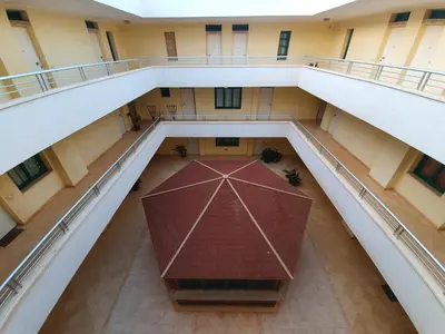 an overhead view of a building with a large umbrella at Holiday Properties Commercial Center - Wi-fi in Santa Maria