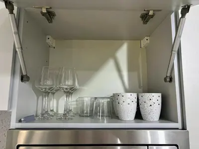 a shelf with wine glasses and wine glasses at Tarrafal Bay - 1Bdr Apt - 3 in Tarrafal