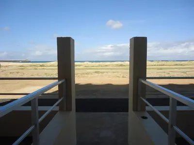 a view of the desert from a balcony of a building at Blu Jasmine in Sal Rei