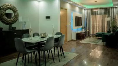 a dining room with a table and chairs at Prainha Beach Apartment I in Praia