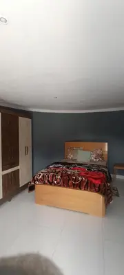 a bedroom with a bed in a room at Casa Mamã in Portela