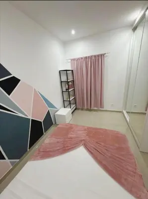 a room with a large red rug on the floor at Peace of mind in Praia