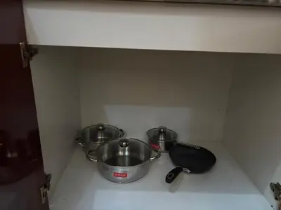 two pots and pans on a counter in a kitchen at Techas Family Beach Stay 3BR in Central Tarrafal in Tarrafal