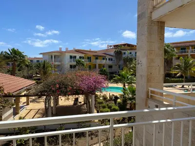 a view of the pool from the balcony of a resort at Suíte Deluxe Soares in Prainha