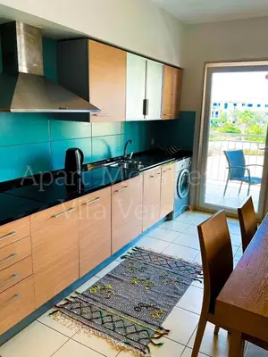 a kitchen with a sink and a counter top at Morabeza Vila Verde in Santa Maria