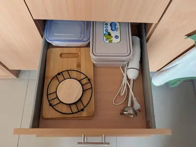 a model of a bedroom with a wooden table in a drawer at SeafrontView - Cozy T1 Apartment 1 in Praia