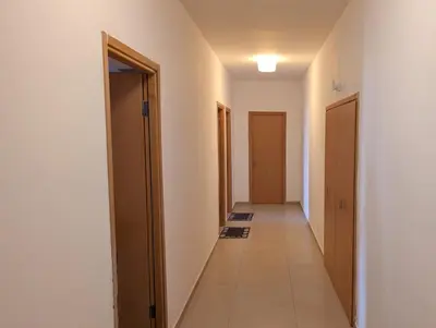 a hallway with two doors and a tile floor at SeafrontView - Cozy T1 Apartment 2 in Praia