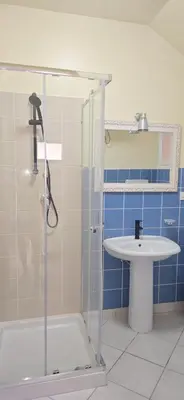 a bathroom with a shower and a sink at Ocean Breeze in Sal Rei