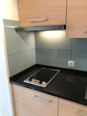 a kitchen with a stove and a counter top at Patys in Santa Maria