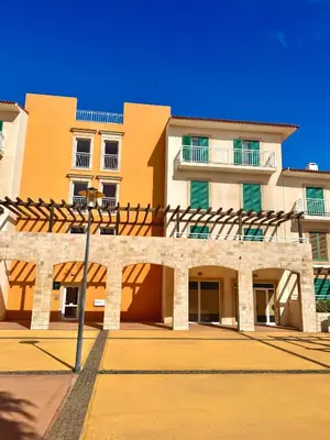a large building with a blue sky in the background at BEACH HOUSE - Walkable to Beach - Wi-Fi Included in Santa Maria