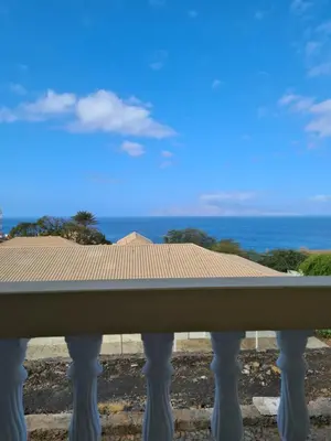 a view of the ocean from a balcony at Djarfogo house in São Filipe